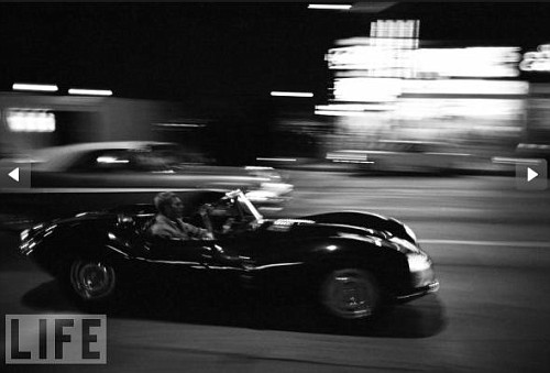 Steve McQueen in His Jaguar XKSS. Trailing Steve McQueen was Dominis' first 